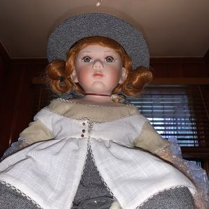 SEYMOUR MANN PORCELAIN DOLL “PENNY”
